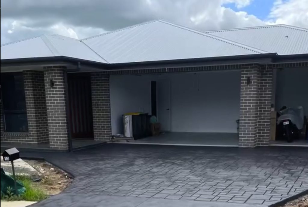 Smooth concrete patio area expertly poured by T&J Landscaping in Northern Beaches