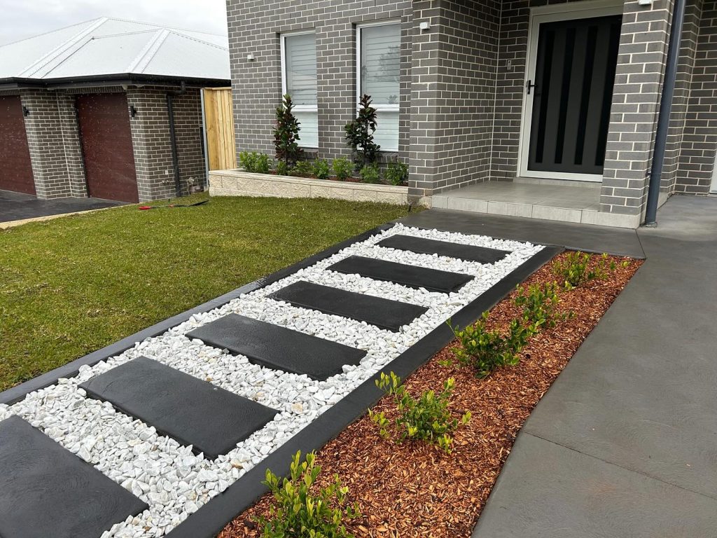 Vibrant garden beds with a variety of plants designed by T&J Landscaping in Sydney