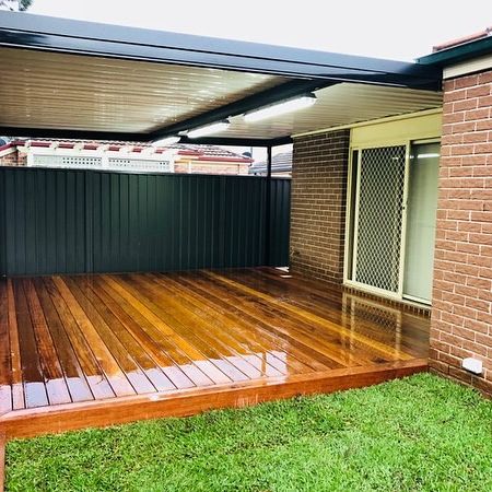 Beautiful wooden deck designed and built by T&J Landscaping, perfect for outdoor living in the Inner West